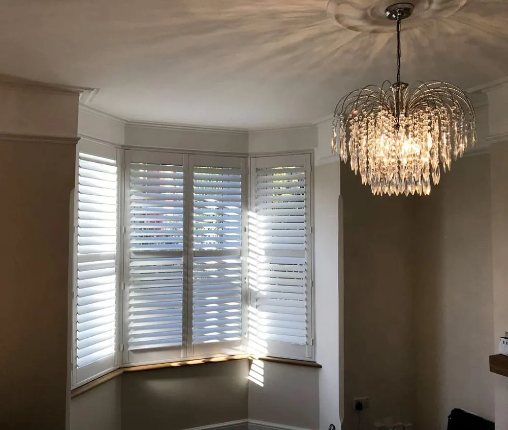 A beautiful living area with shutters from Hardcastle Shutters